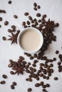 Flatlay coffee cup and coffee beans on a white background