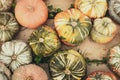 Flatlay, colorful pattypan squash, summer squash pumpkin background