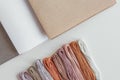 canva aida beige, gray and white and multi-colored floss thread, all for cross stitching