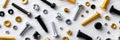 Flatlay of Diverse Construction Fasteners and Screws Spread on a White Desk, Suitable for Home Improvement and DIY Royalty Free Stock Photo