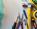 Flatlay of DIY tools, hammer, pliers, screwdriver for handymen. Manual work