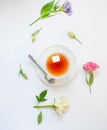 Flatlay with elegant tea set, spoon and levitating cube of sugar Royalty Free Stock Photo