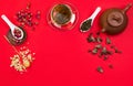 Flatlay frame arrangement with Chinese green tea, rose buds, jasmine flowers and dry tea leaves Royalty Free Stock Photo