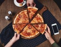 Flatlay. Friends eat pizza.