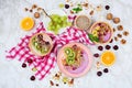 Flatlay with healthy vegan breakfast arrangement on marble background