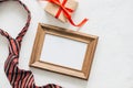 Flatlay image of gift box, necktie and blank frame. Father`s day