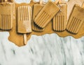 Flatlay of melting coffee latte popsicles, copy space, top view