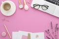 Flat lay mockup female workspace with women`s office desk laptop, lavender, makeup accessories, notebook, glasses