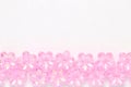 Flatlay Pink Plastic flower on white background