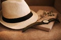 Flatlay of summer straw hat, retro hand watches and a book. Traveler items, vacation travel accessories, holiday weekend, day off Royalty Free Stock Photo