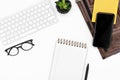 Flatlay White office desk table. keyboard, glasses, smartphone, notebook and laptop case. copy space layout Royalty Free Stock Photo