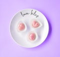 Flatlay of white plate with gentle ruby chocolate Royalty Free Stock Photo