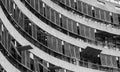 Flats at The Barbican Centre, London, UK, showing post-war Brutalist style architecture. Photographed from street level in monochr Royalty Free Stock Photo