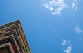 Flats built in post-war Brutalist style architecture at The Barbican in the City of London UK, with colourful flowers on the balco Royalty Free Stock Photo