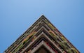 Flats built in post-war Brutalist style architecture at The Barbican in the City of London UK, with colourful flowers on the balco Royalty Free Stock Photo