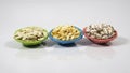 Flattened rice, puffed rice, and popped rice in color paper thonga bowl on white background studio shoot. local name chira, Muri,