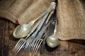 Flatware the old wooden table with a rustic style. Royalty Free Stock Photo