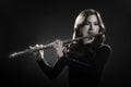 Flautist playing flute Royalty Free Stock Photo