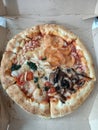 4 flavor pizza. Western food. Button mushroom, shrimp, pepperoni, haiwaiian chicken. Thick crust pizza