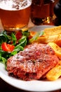 Flavored Beef Steak and Fries on Plate Royalty Free Stock Photo