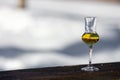 Flavored Grappa Schnapps glass in Cortina d`Ampezzo, Dolomites, Italy