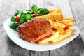 Flavored Grilled Meat with French Fries on Plate Royalty Free Stock Photo