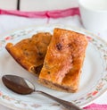 Flavored pudding cake with apricot jam and orange zest Royalty Free Stock Photo