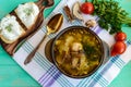 Flavored soup of dried porcini mushrooms in a glass tureen. Organic food. Royalty Free Stock Photo