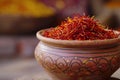 A flavorful dish of saffron rice is placed in a bowl on a table, showcasing its vibrant yellow color, Cupful of saffron threads,