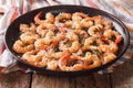 Flavorful food: shrimp in garlic sauce with parmesan cheese and Royalty Free Stock Photo