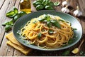 A Flavorful Presentation: Cooked Spaghetti Aglio e Olio with Garlic and Olive Oil, Glistening with Chili Flakes Sprinkled