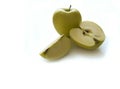 Flavovirent apple and the flavovirent cut apple Royalty Free Stock Photo