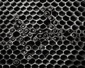 flawless hexagonal pattern of a honeycomb.