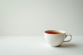 Flawless Image of Closeup of Tea Cup on Table Against White Background Royalty Free Stock Photo