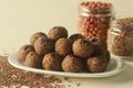 Flax seed peanut laddu. Indian sweet made with coarsely ground flax seeds and groundnuts with freshly grated coconut and jaggery,