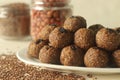 Flax seed peanut laddu. Indian sweet made with coarsely ground flax seeds and groundnuts with freshly grated coconut and jaggery,