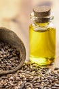 Flax seeds and bottle of linseed oil Royalty Free Stock Photo