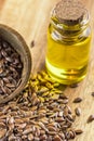 Flax seeds and bottle of linseed oil Royalty Free Stock Photo