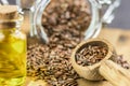 Flax seeds and bottle of linseed oil Royalty Free Stock Photo