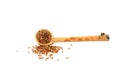 Flax seeds. Flaxseed powder in a wooden spoon. Standing on a white background Royalty Free Stock Photo