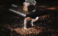 Flax seeds in glass jar, brown kitchen table background, selective focus