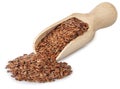 Flax seeds in wooden scoop on white