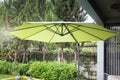 Flaxen garden umbrella in summer
