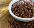 Flaxseeds in white bowl Royalty Free Stock Photo