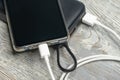 Flay lay of phone and charging devices, power storage and charging cable Royalty Free Stock Photo