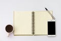 Flay lay space on the desk Area space enter text. mockup coffee cups, Pen note paper Placed on a White table wood