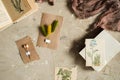 Flay lay, top view of the herbarium, dried lavender flowers, notebook, book for notes, pen and spring summer pictures on a concret Royalty Free Stock Photo