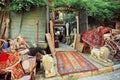 Flea market with antique furniture and asian carpets