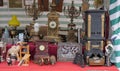 Flea market. Old stuff for sale. Clocks, figures, bottles, lamps