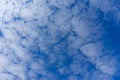 Fleecy clouds with blue sky, Texture background Royalty Free Stock Photo